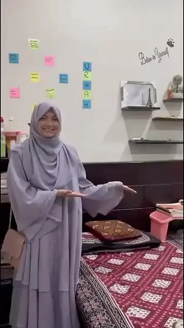 A resident showing her room at Rabia Hall Girls Hostel, Multan